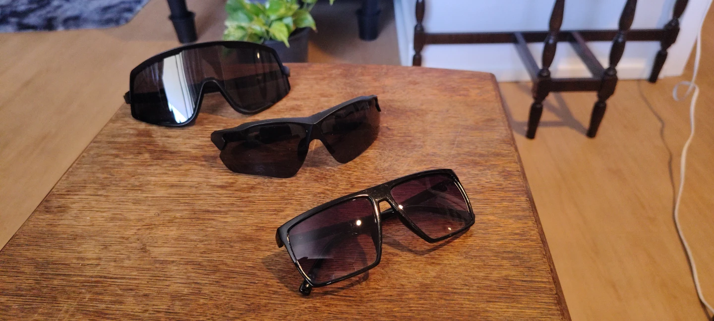 Three Pairs of Sunglasses