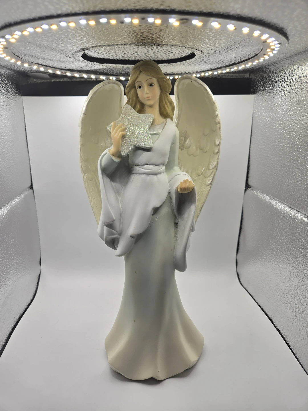 Angel Figurine Holding a Sparkling Star