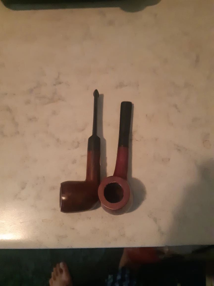 Two wooden smoking pipes