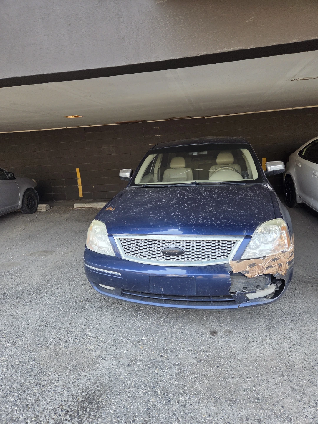 Blue Ford Sedan