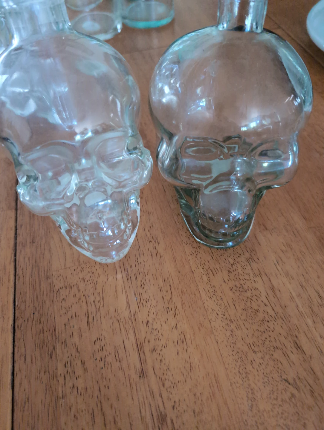 Set of 2 Glass Skull Shaped Bottles