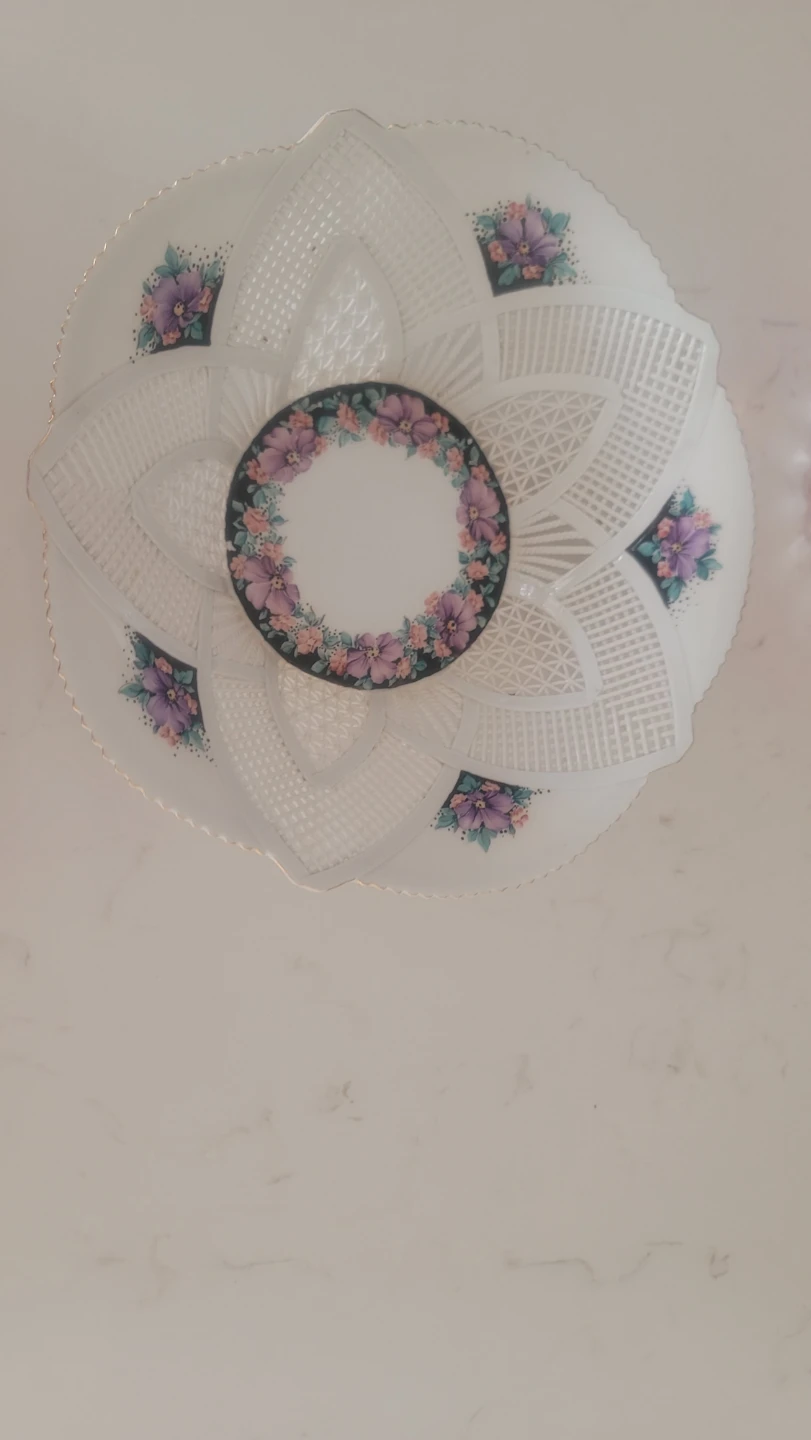 Decorative White Lace-Style Bowl with Floral Accents