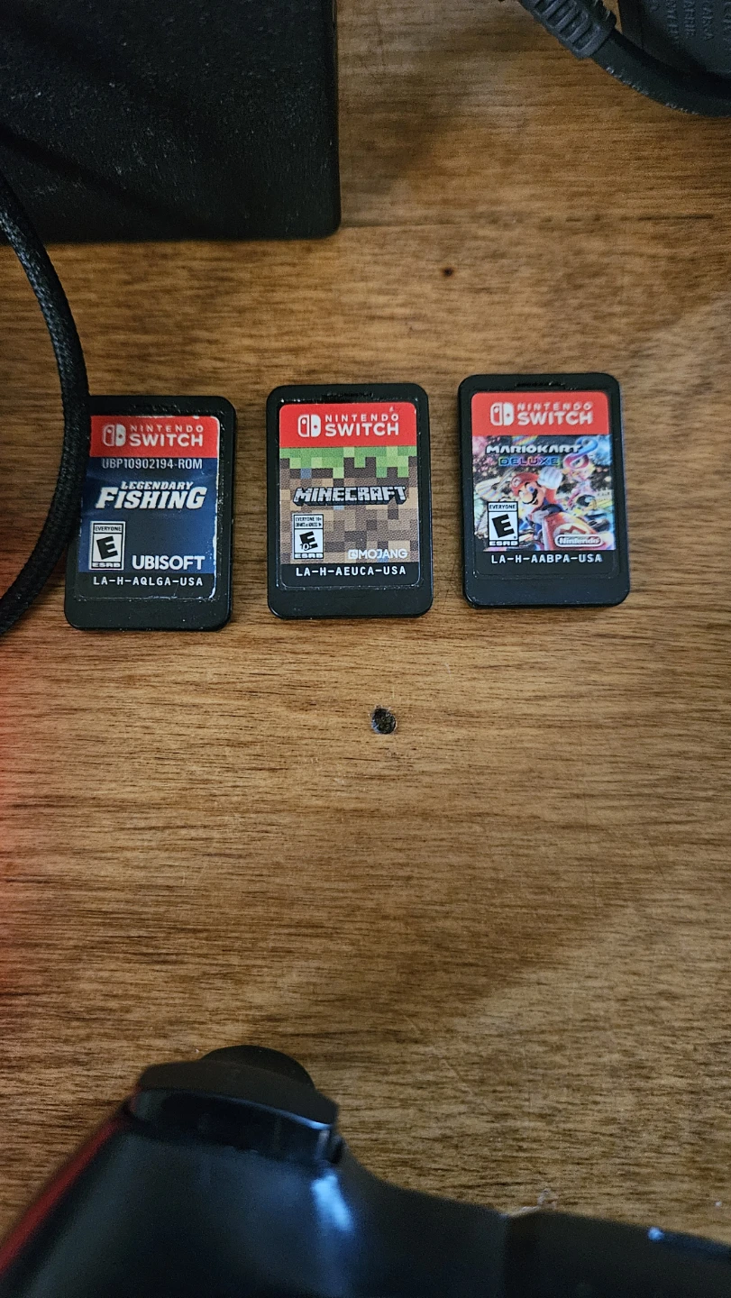 Nintendo Switch Console with Games and Accessories - photo 2