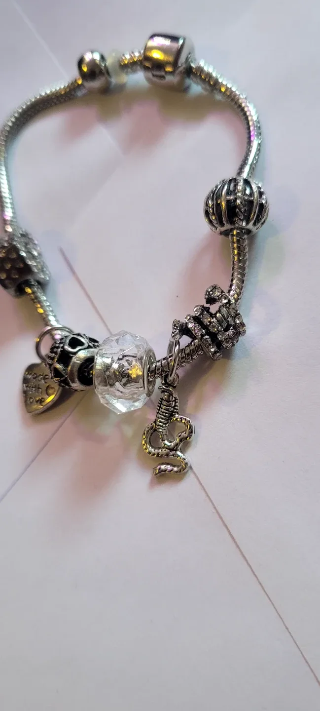 Charm Bracelet with Snake and Crown Charms