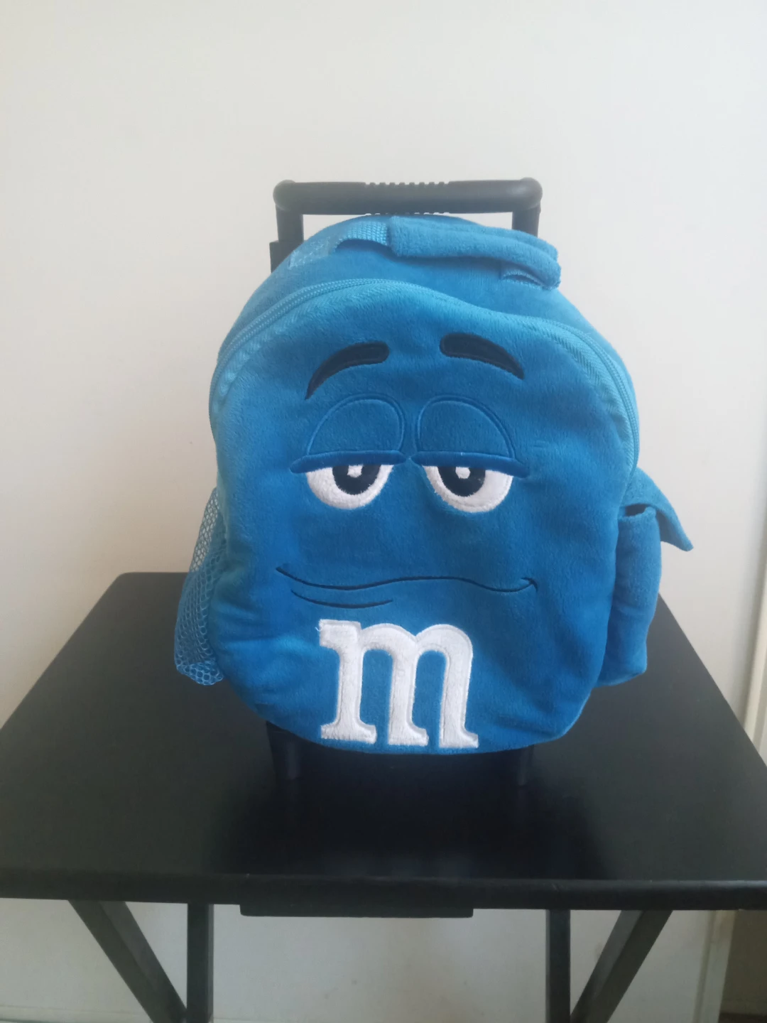 Blue M&M Plush Rolling Backpack