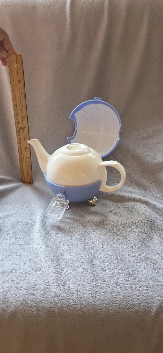 White ceramic teapot with blue insulated cozy - photo 2