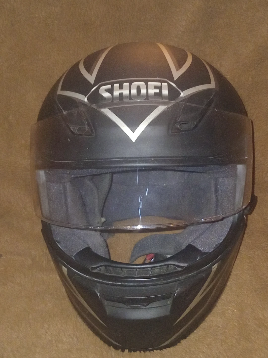 Black Shoei motorcycle helmet