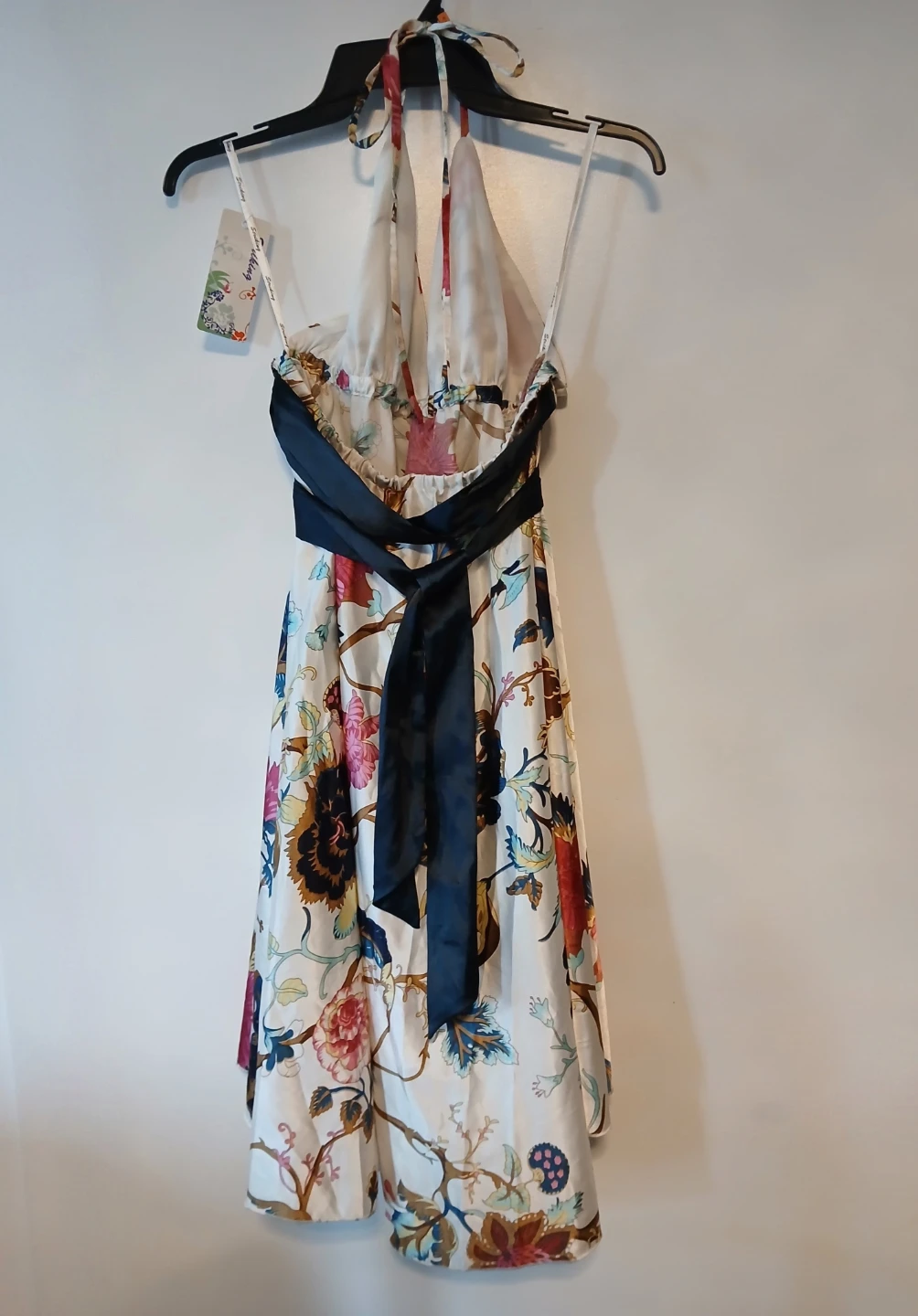 Striking floral halter neck dress with black waist tie. - photo 3