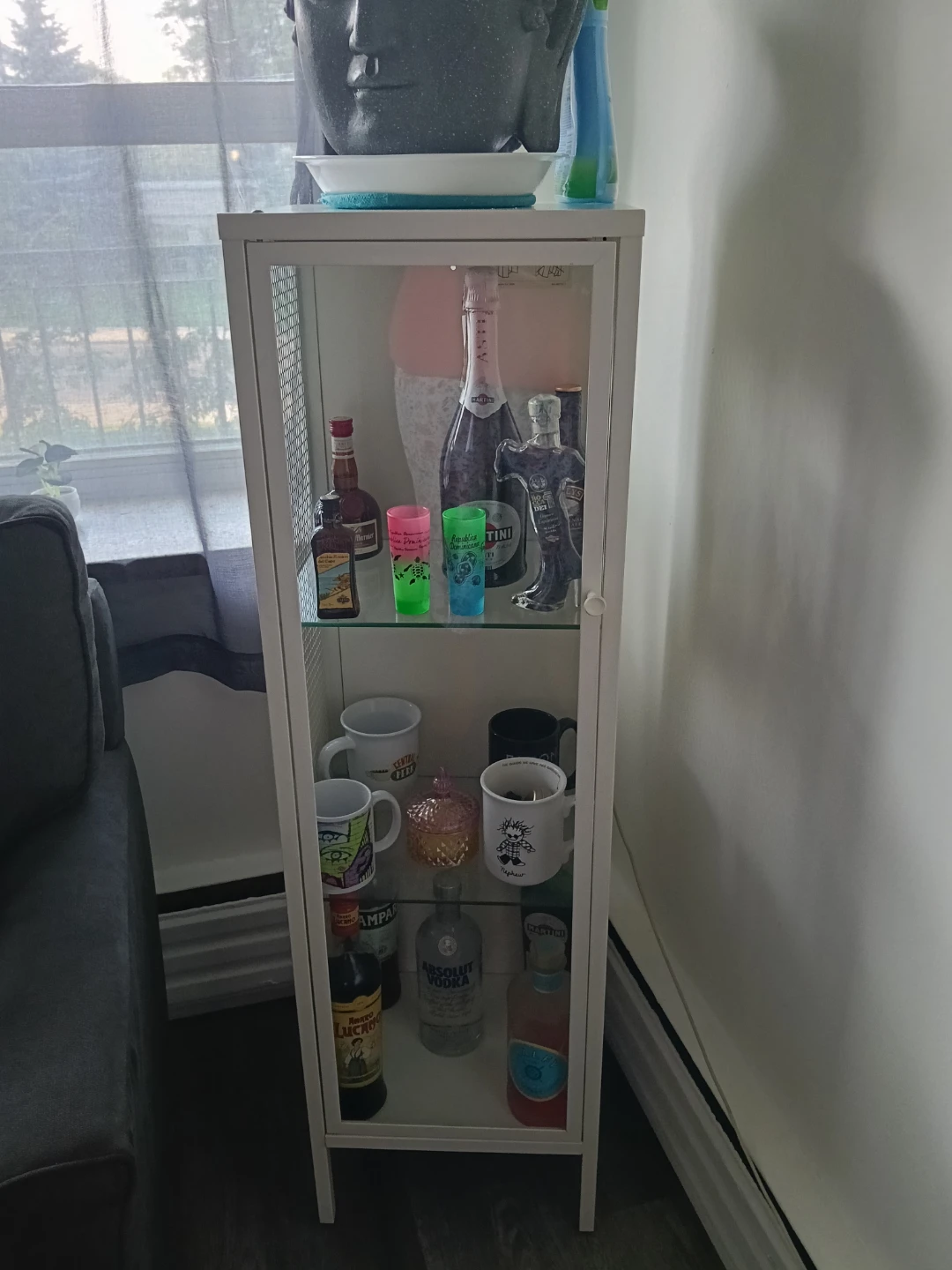 White IKEA glass cabinet