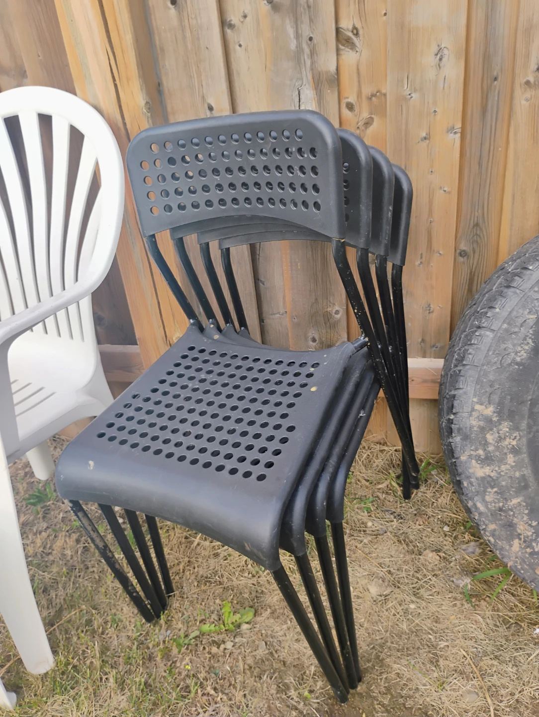 Ikea Black Stackable Plastic Chairs (Set of 4) - photo 3
