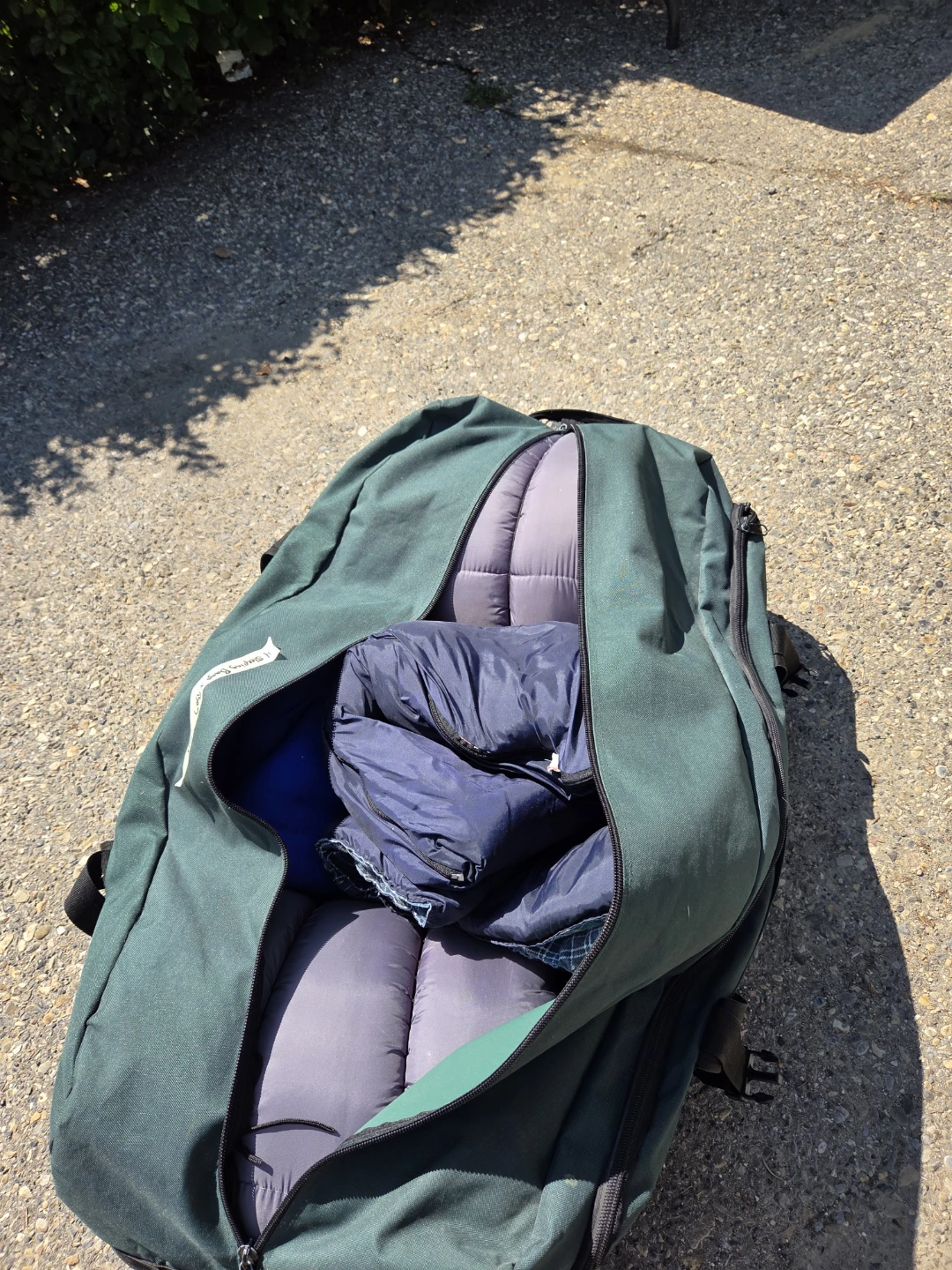 Green Duffel Bag with 4 Sleeping Bags