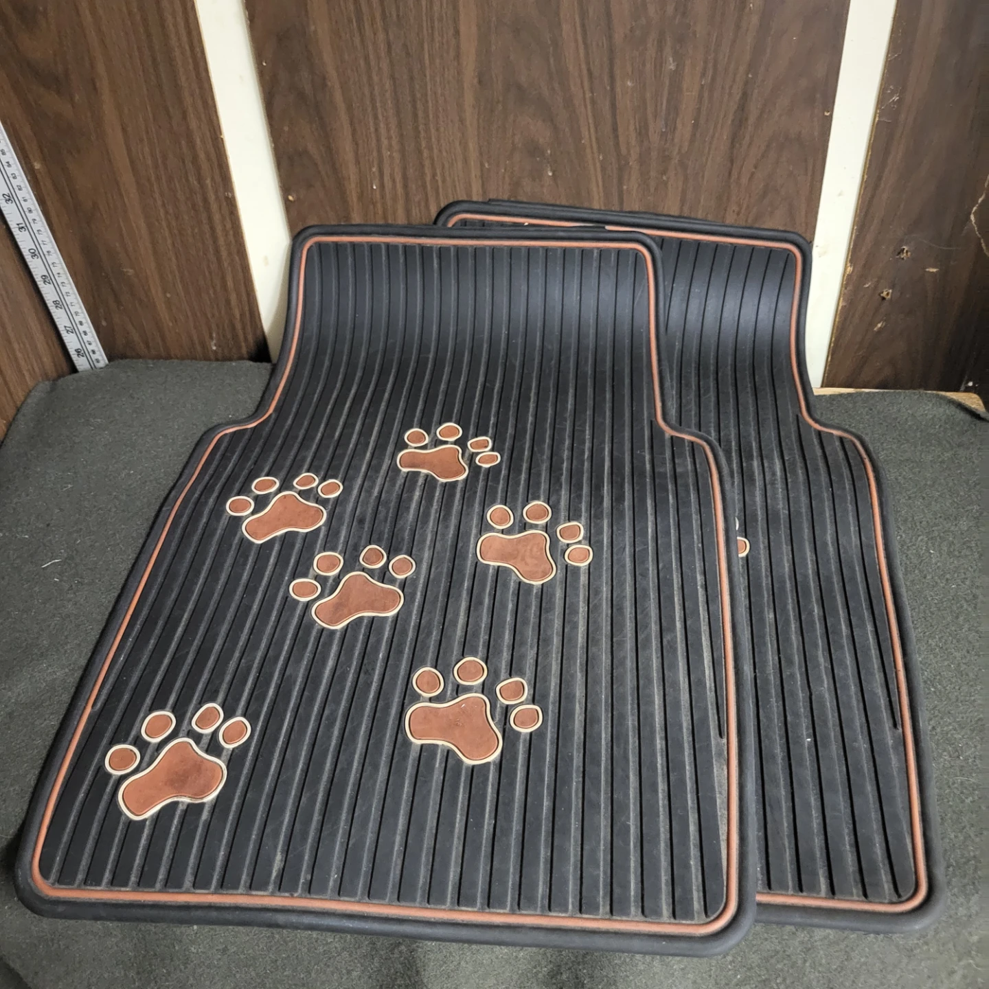 Pair of Black Rubber Floor Mats with Paw Print Design