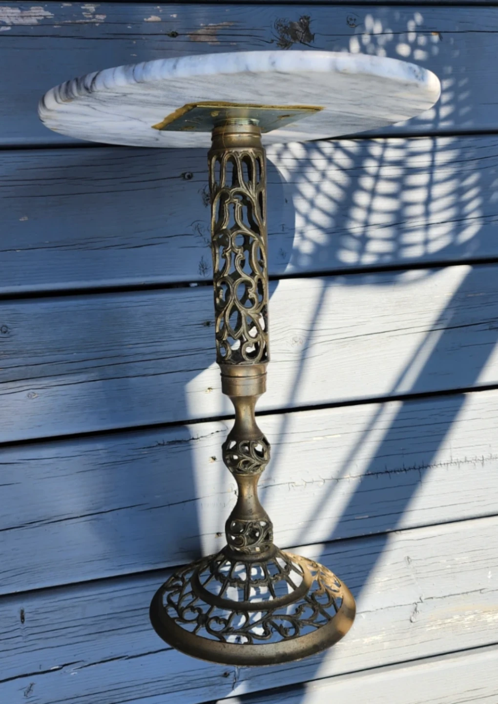 vintage side table features a white marble top with an ornate - photo 3