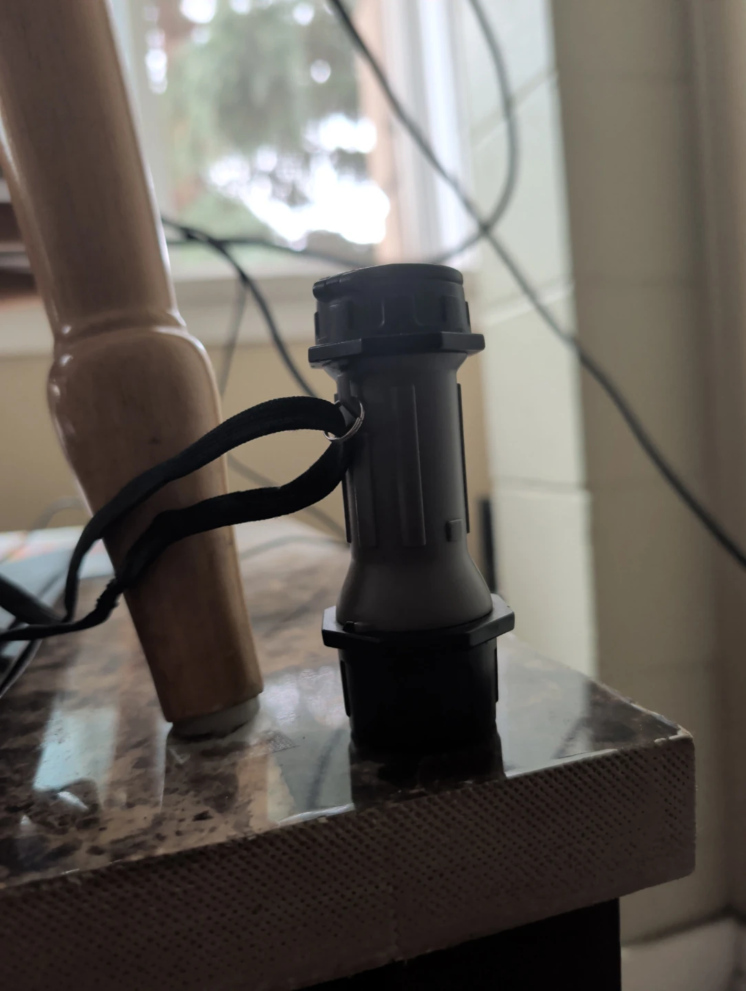 Compact Grey and Black Keychain Flashlight