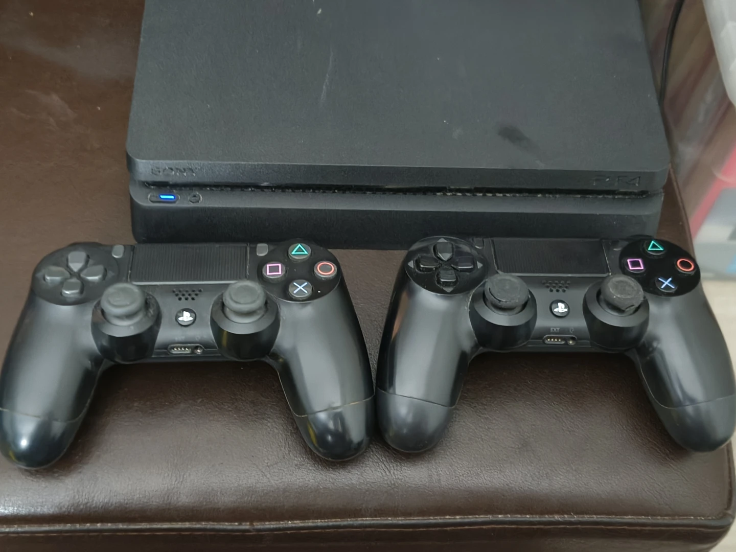 Sony PS4 Slim Bundle with 2 Controllers,9 Games (1TB) - photo 3
