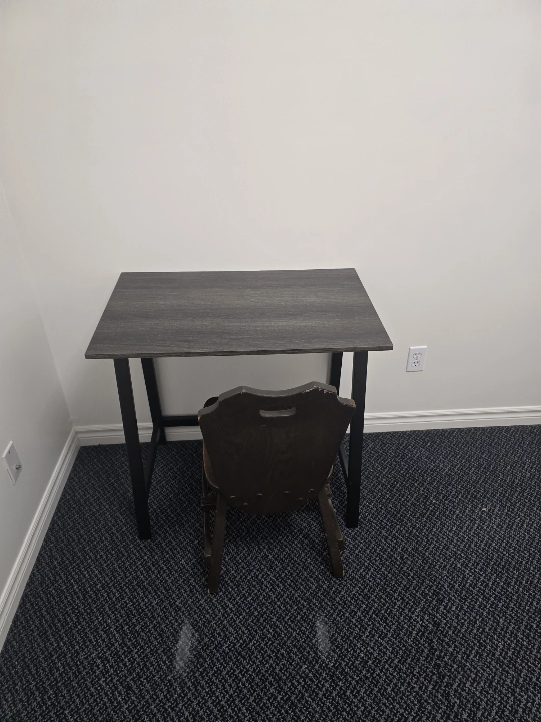 Desk and wooden chair