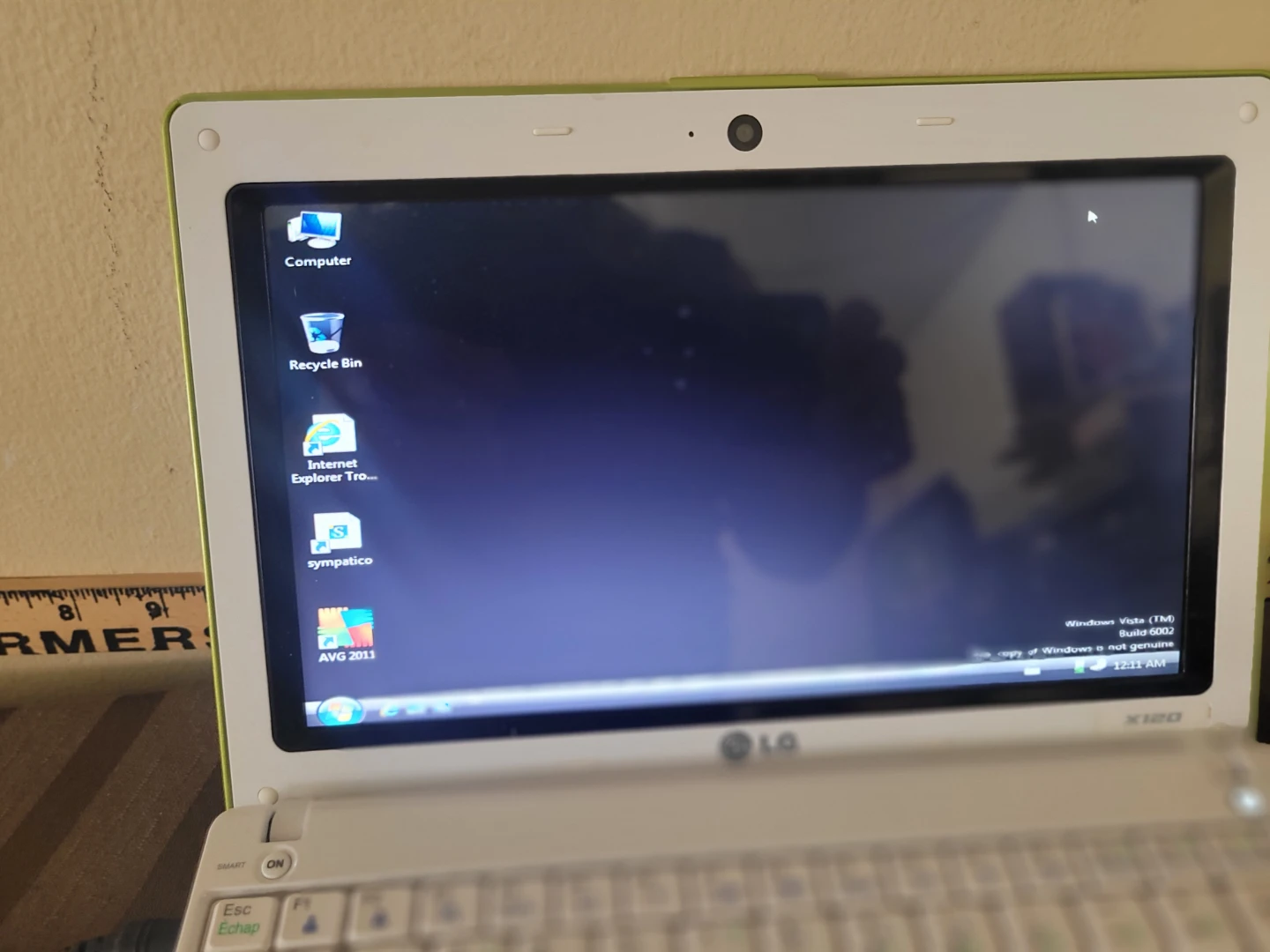 LG X120 netbook and a black HP 2000 laptop - photo 5