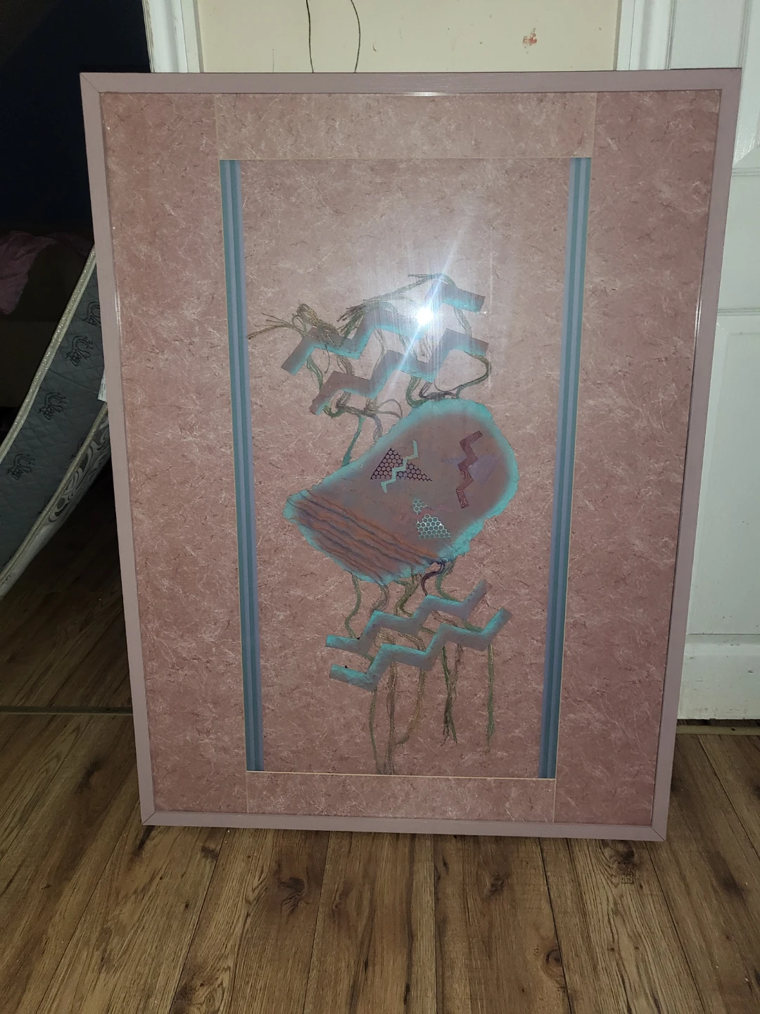 Abstract framed wall art in pink and turquoise