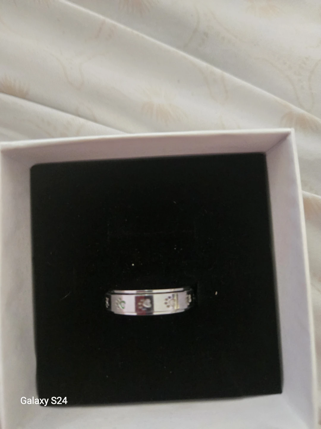 Stainless steel dog paw spinner anxiety ring