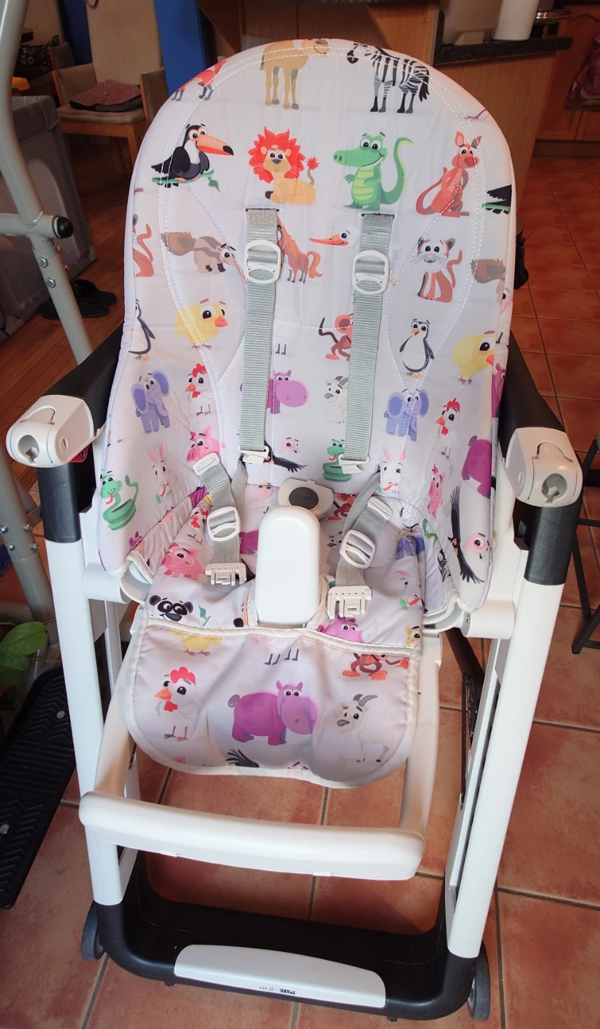 Peg Perego Siesta High Chair includes two seat covers