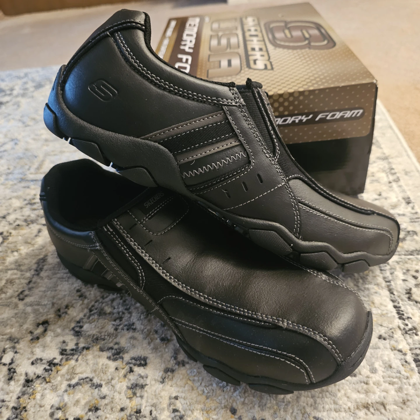 Brand- new Skechers Men's Black Slip-On Shoes