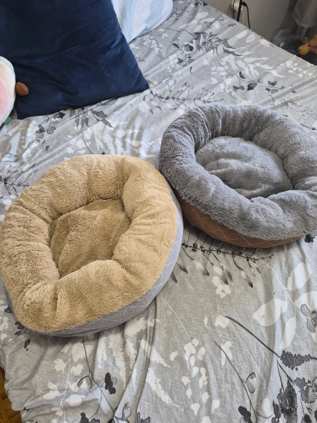 Two plush pet beds