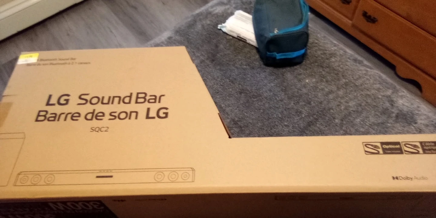 Philips 32" QLED Roku TV and LG Sound Bar - photo 3