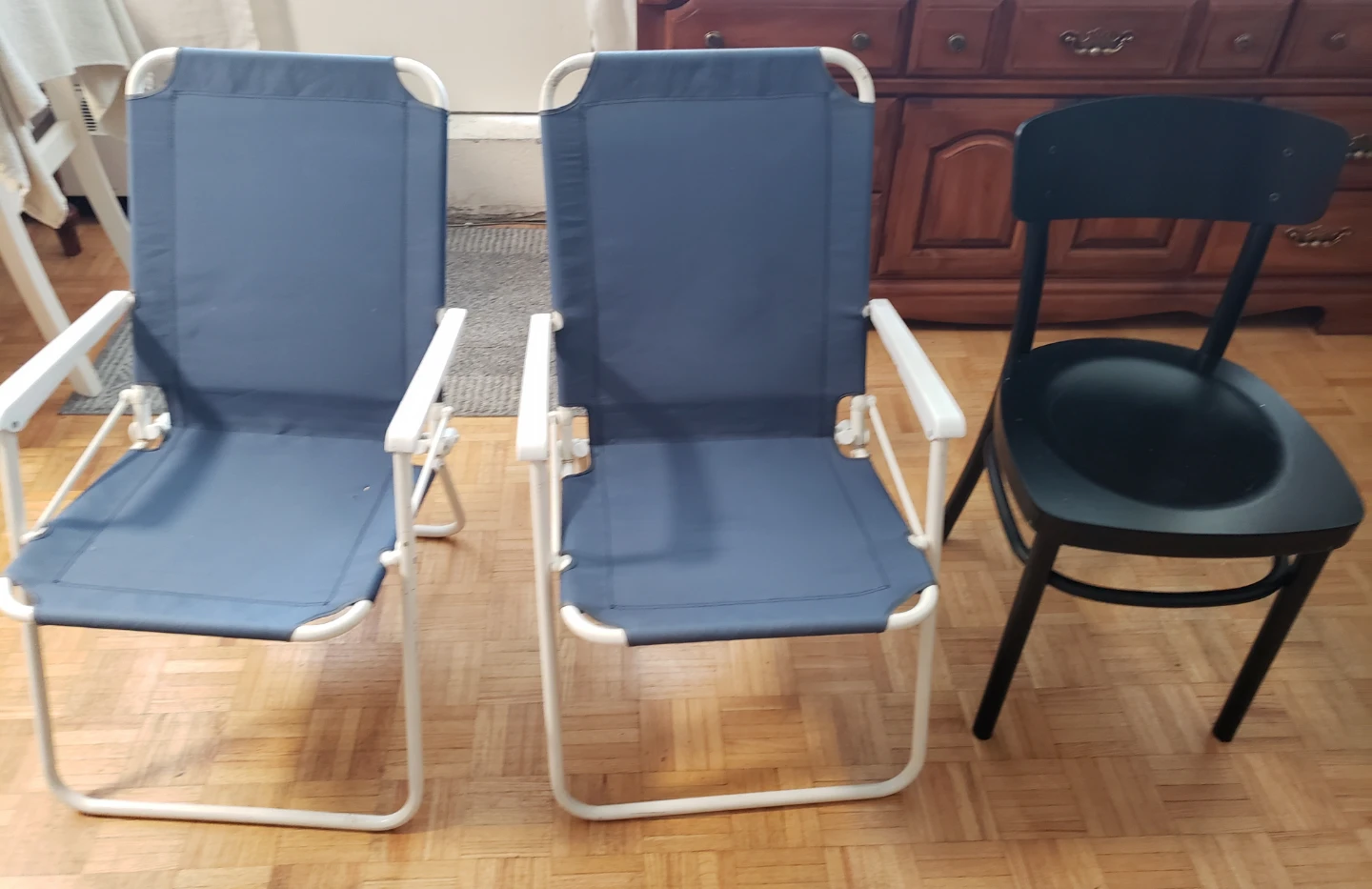 3 chairs 2Blue Folding Beach Chairs and one solid  wood chair