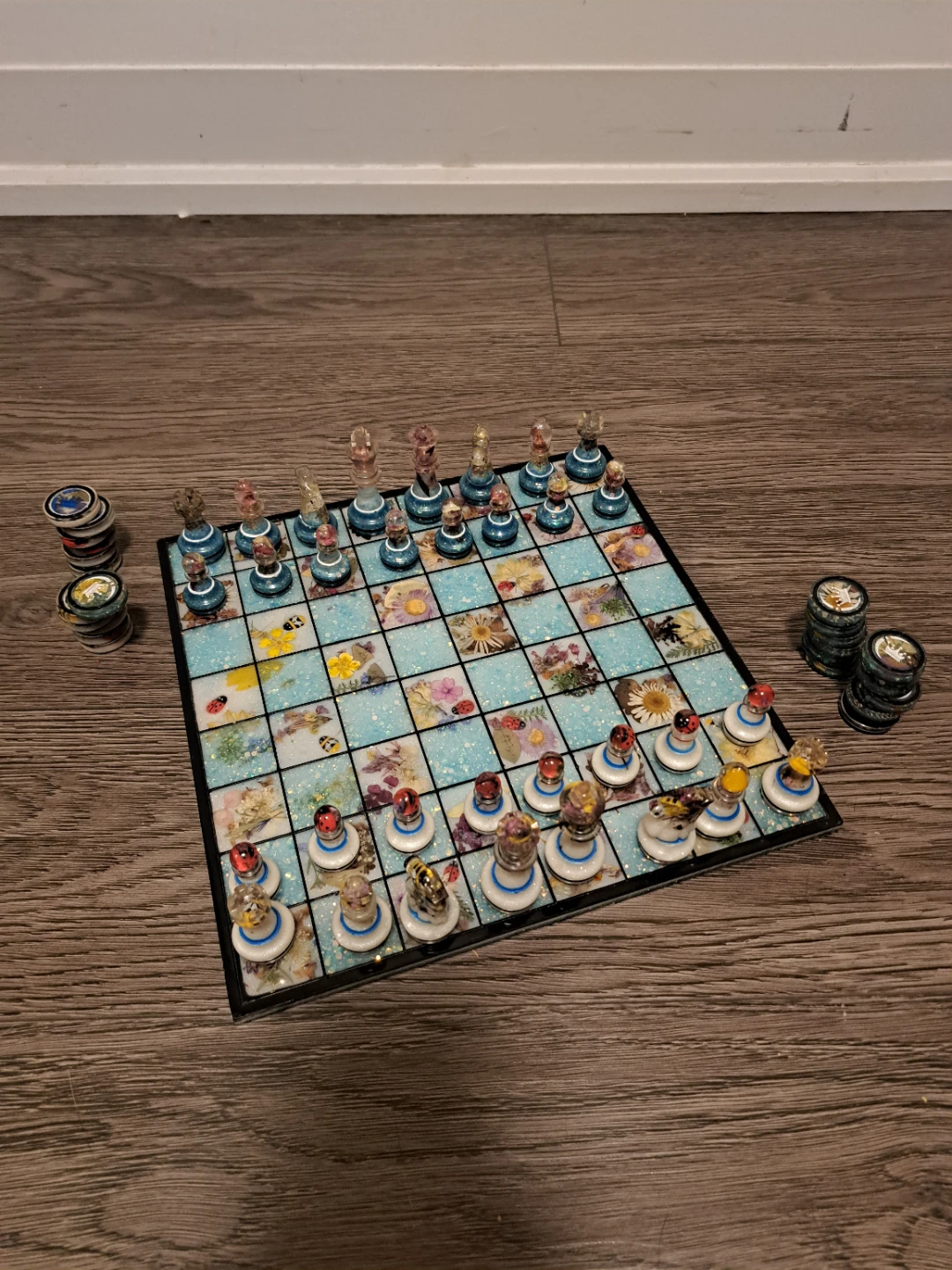Custom chess/checkered board plus pieces