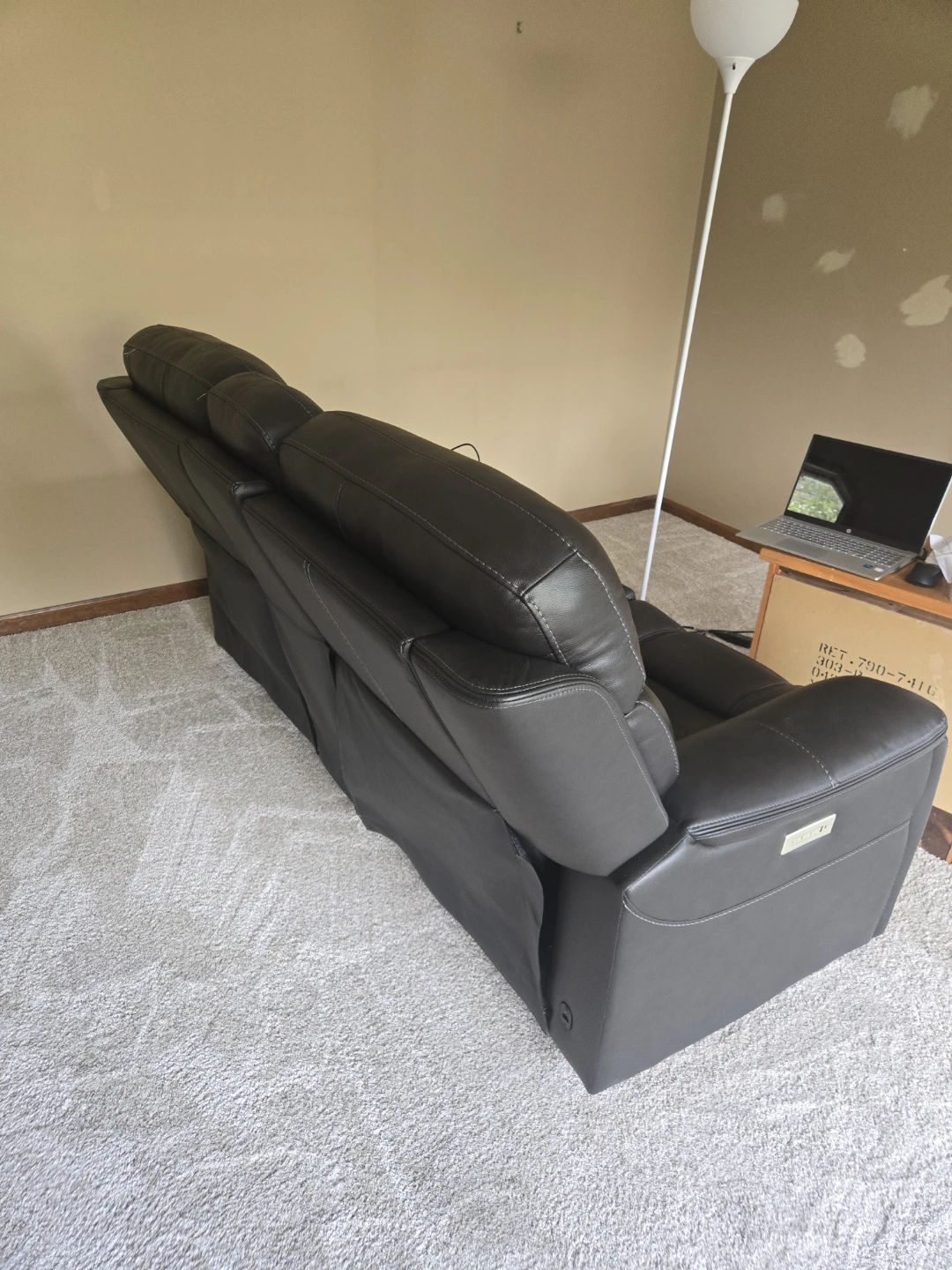 Black faux leather Loveseat.  Some tears, no powercord. - photo 3
