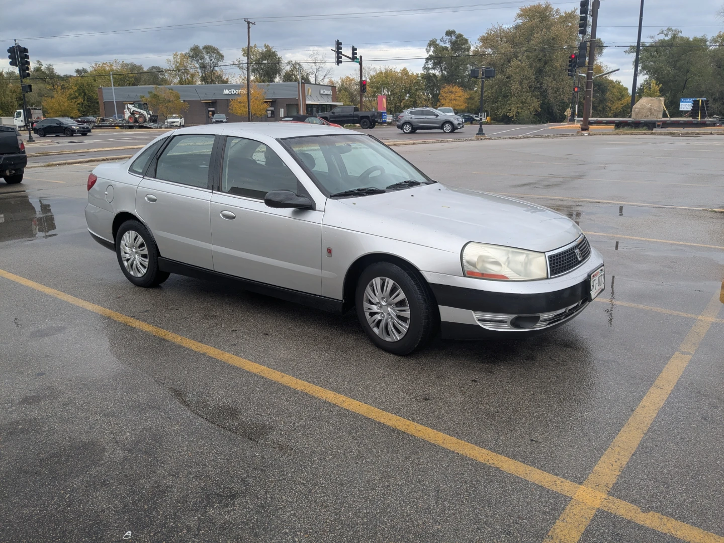 Silver Saturn L200 Sedan - photo 3