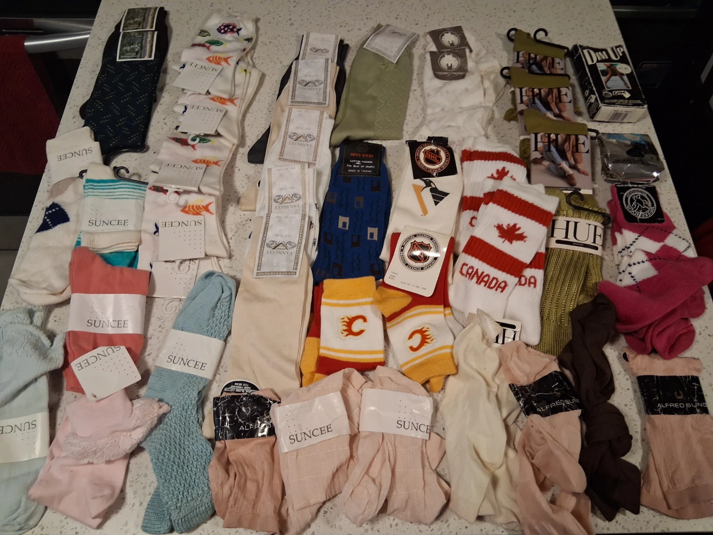 40 pairs of socks, panty hose and more
