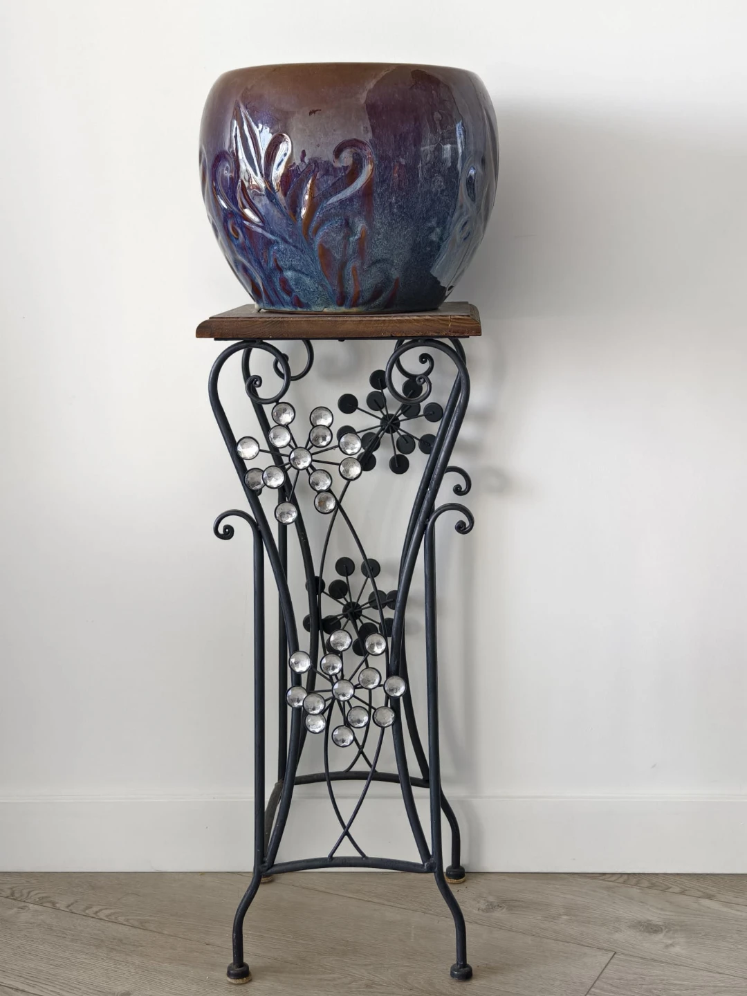 Decorative Ornate Wrought‑Iron Stand with a free ceramic pot