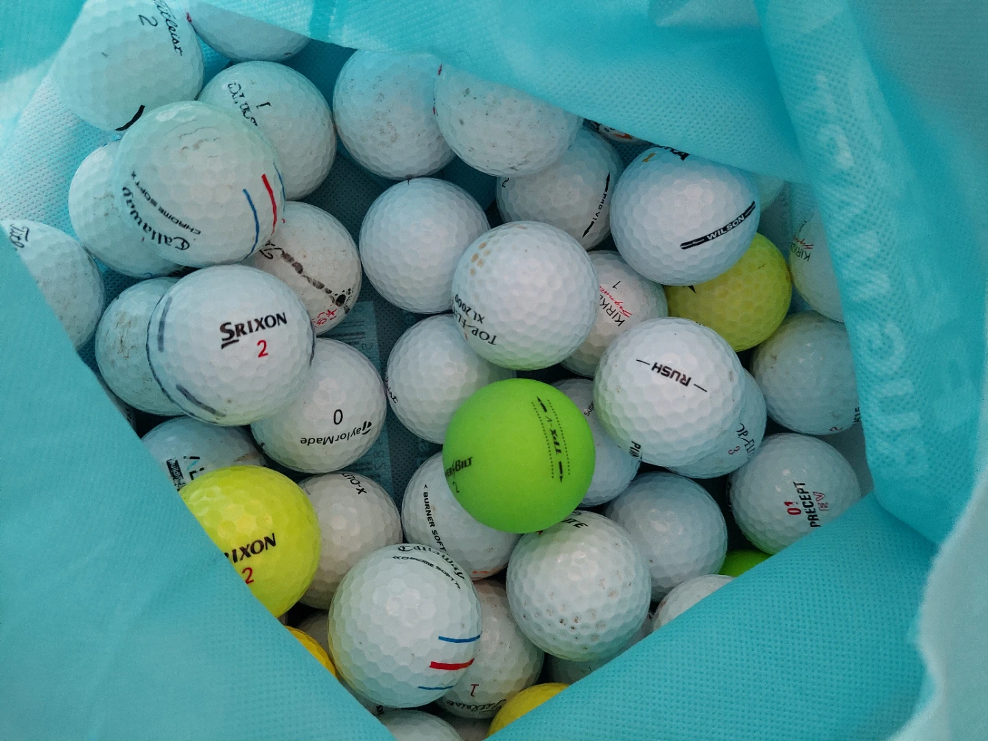 Assortment of 54 Golf Balls - Srixon, Callaway, Wilson & More