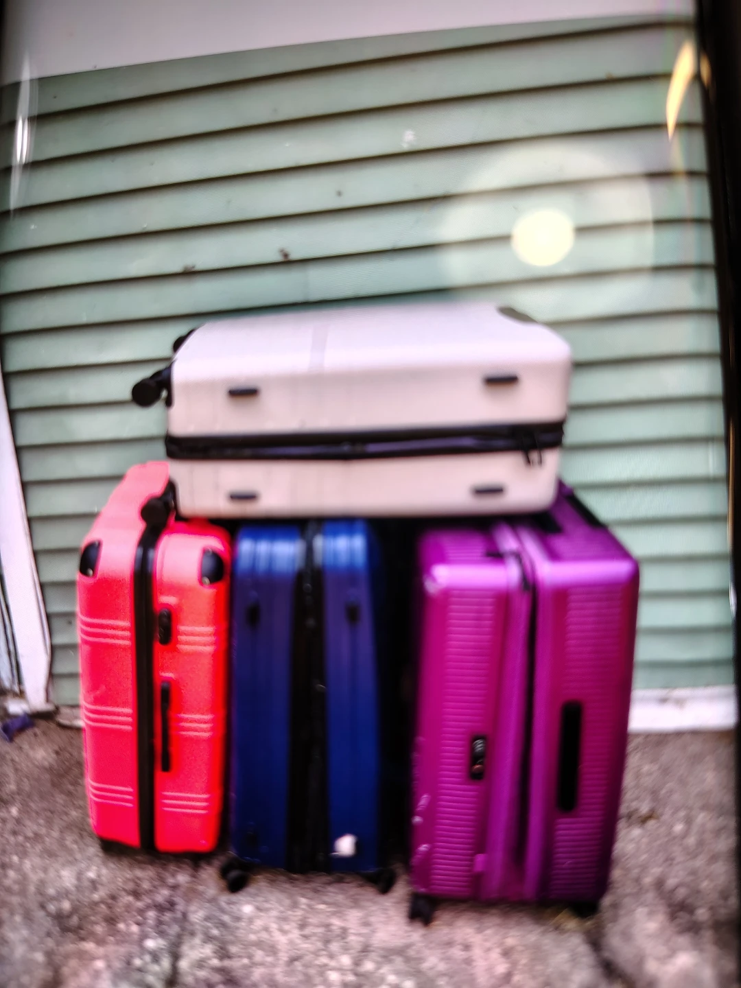 Luggage Set - Red, Blue, Purple, and White Suitcases