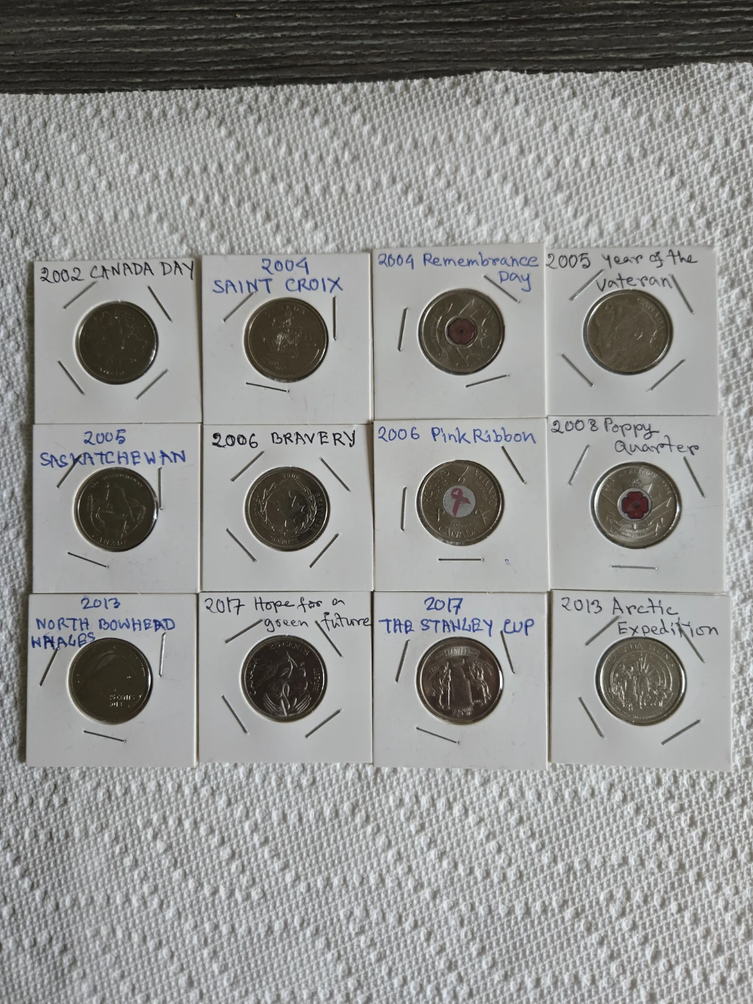 Collection of 12  Canadian Quarters