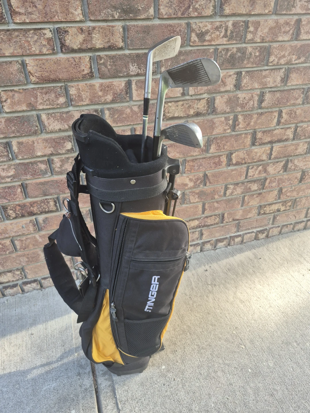 Youth Black and Yellow Golf Bag With Some Irons - photo 2