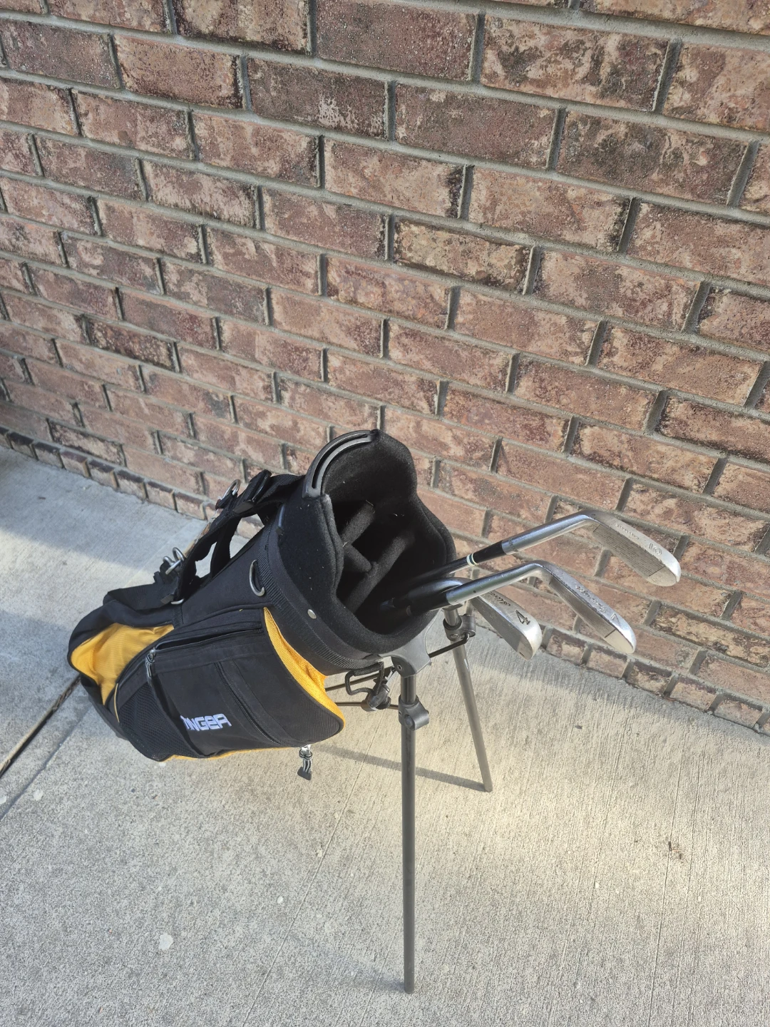Youth Black and Yellow Golf Bag With Some Irons - photo 3
