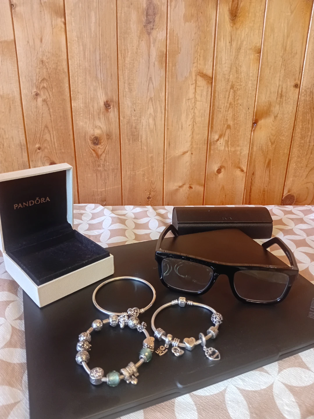 Pandora Bracelets and Prada Glasses