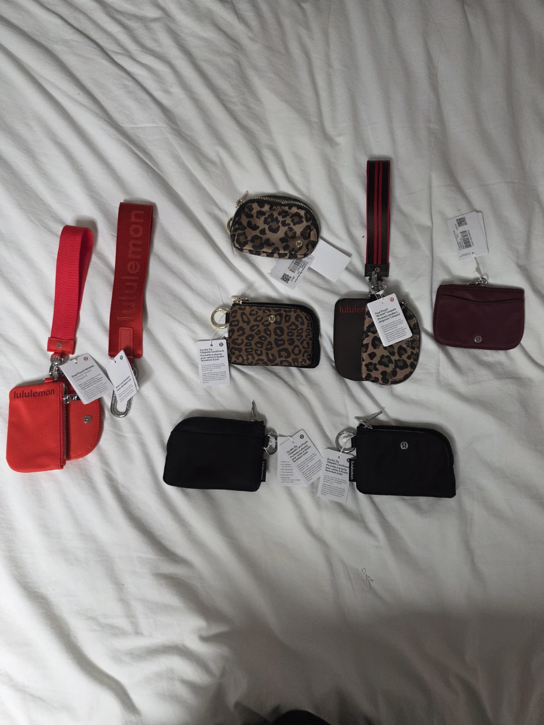 Brandnew authentic Lululemon wristlet bags and dual wallets .