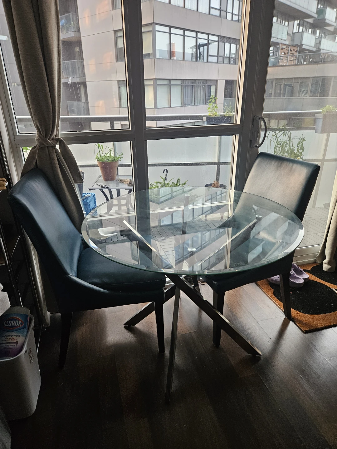 Glass Top Dining Table with Teal Chairs