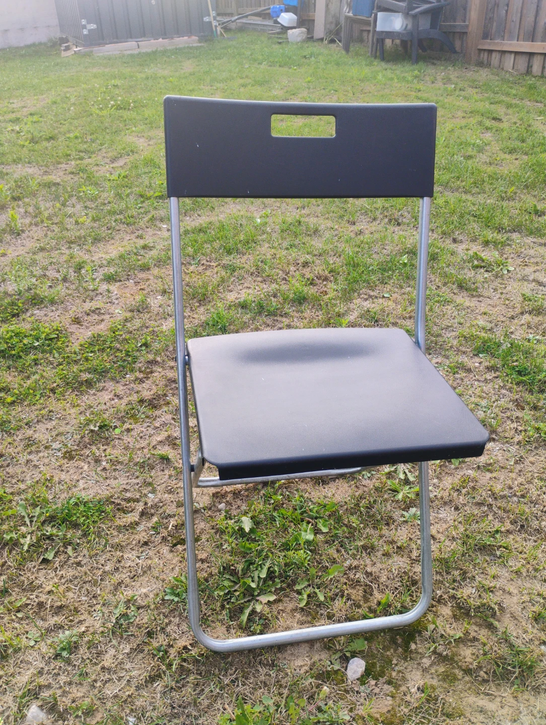 Four black Ikea folding chairs - photo 2
