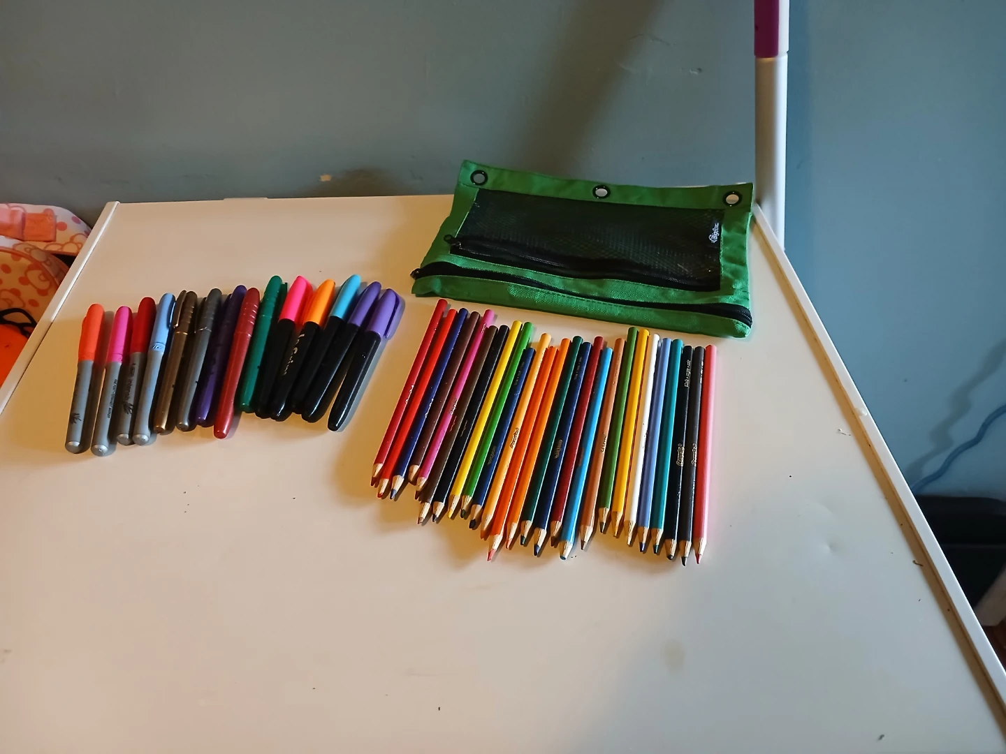 Assorted Markers, Pencils, and Pencil Case