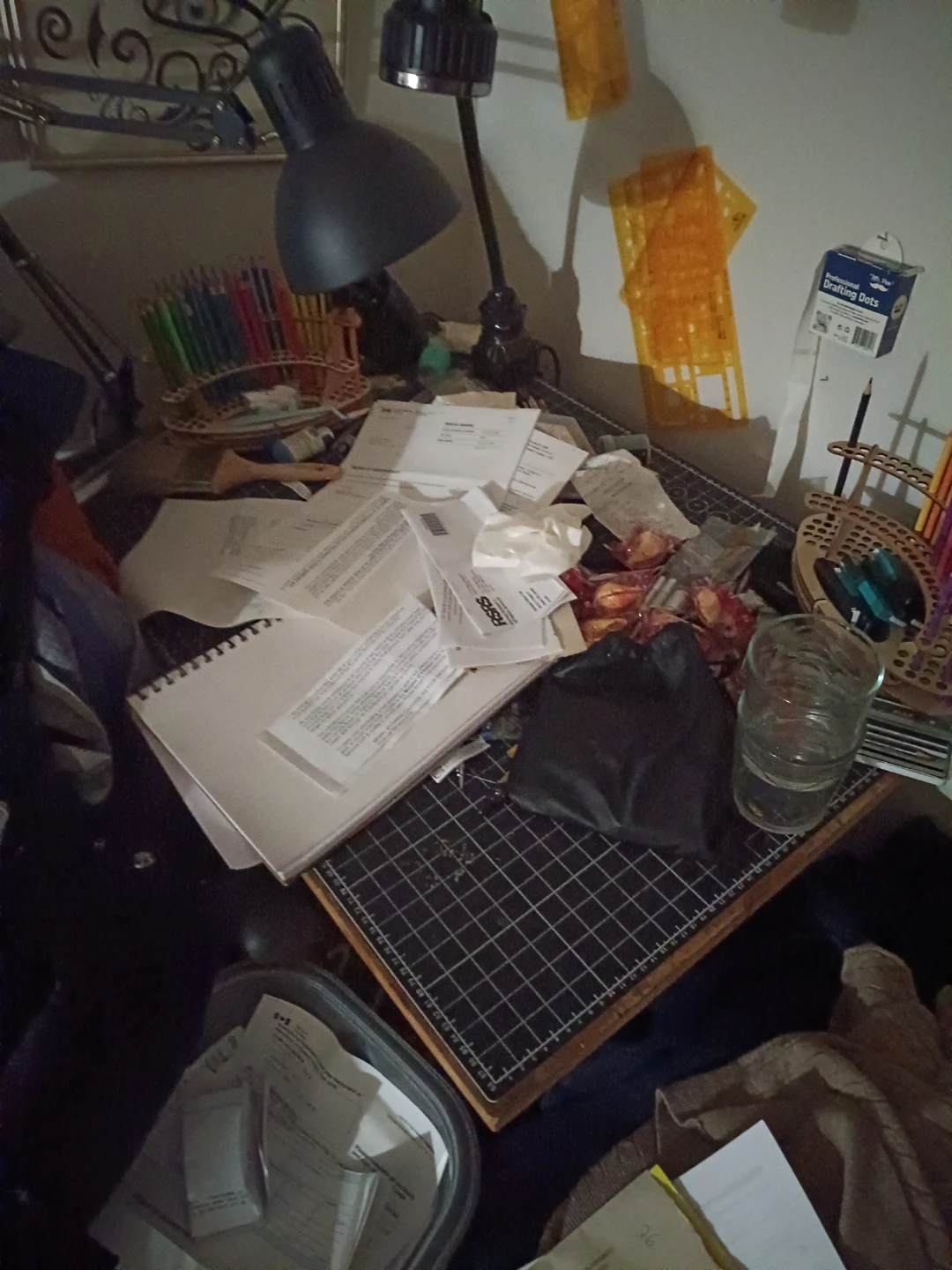 Art supplies and drafting table and chair