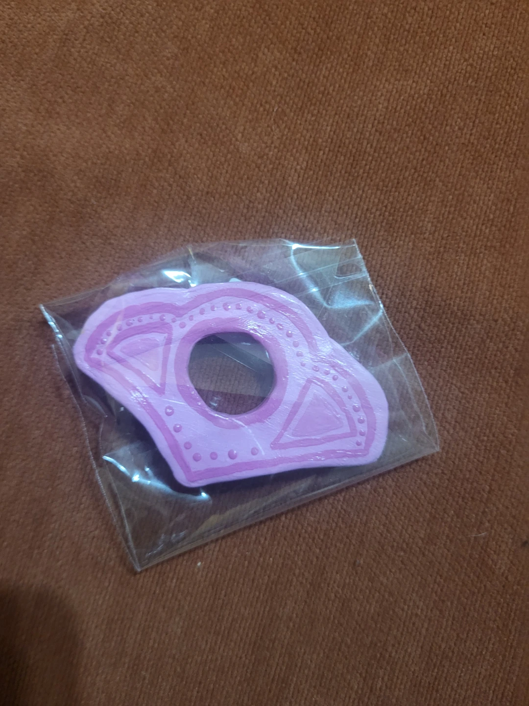 Pink book thumb holder