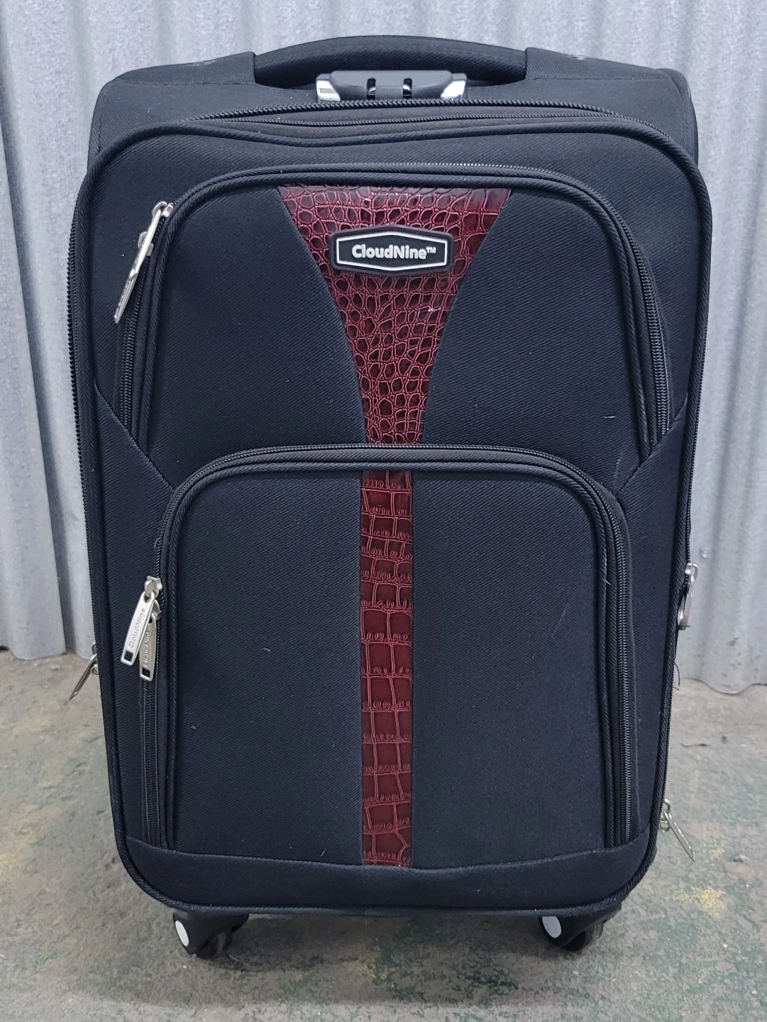 Cloud Nine Black Spinner Carry-on suitcase