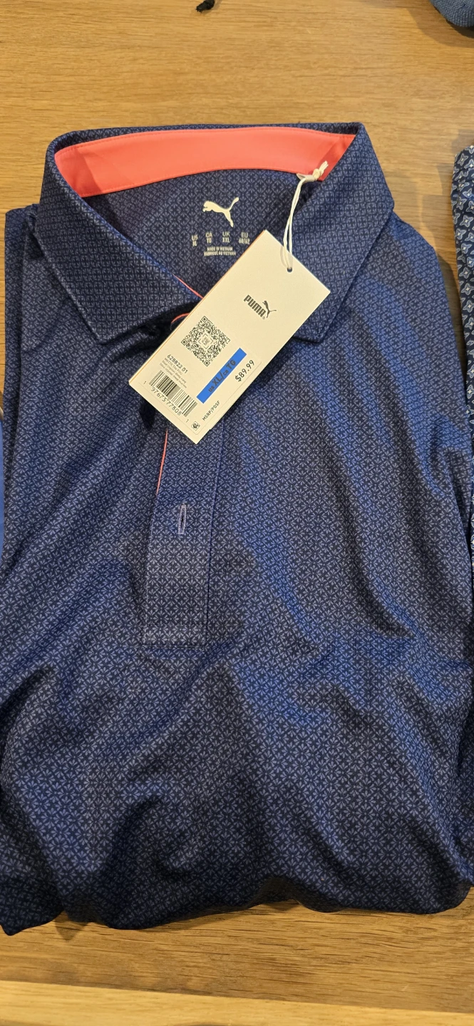 3 XL golf shirts, and 1 hat.  Retail value $270