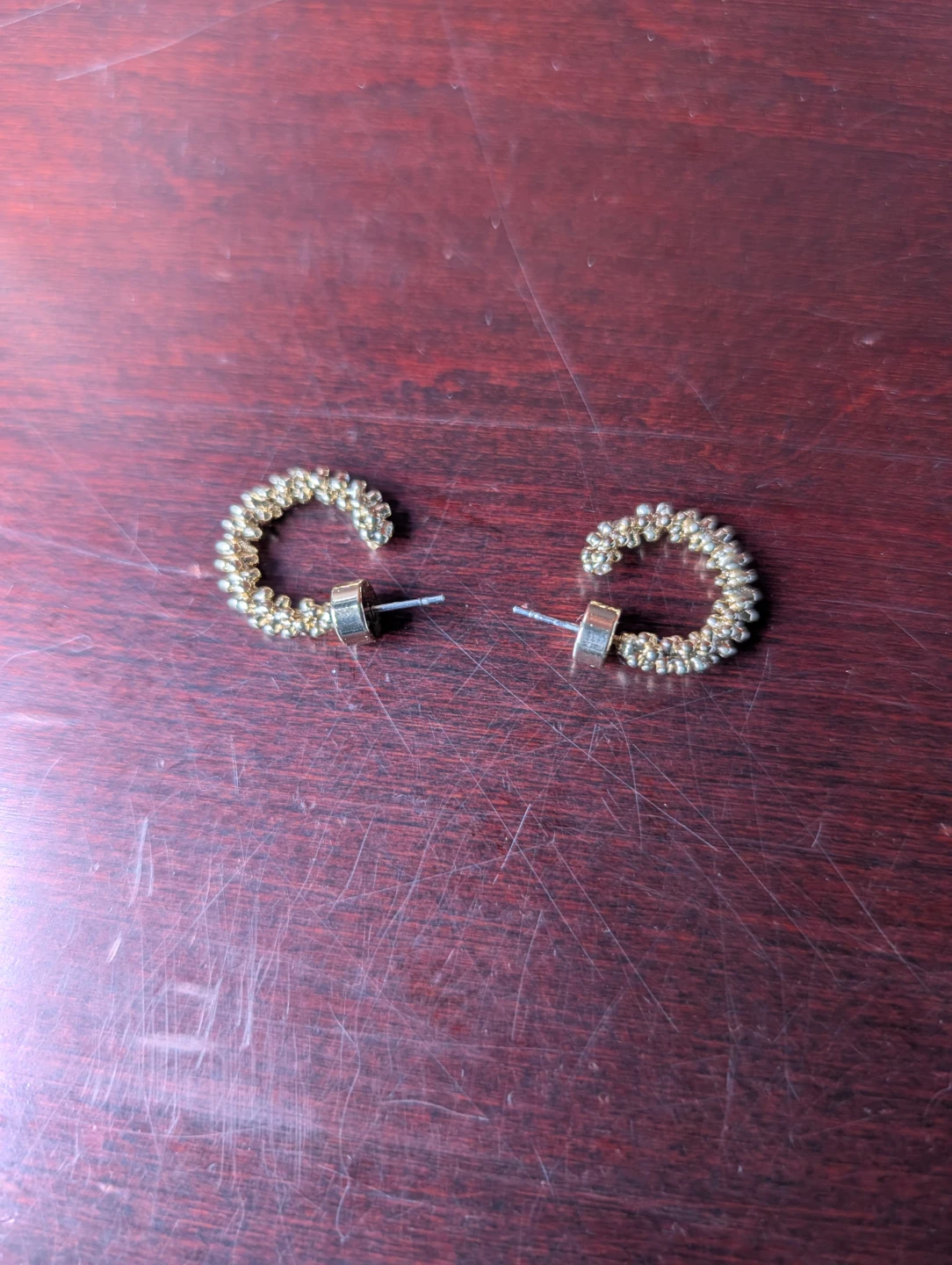 Gold tone beaded hoop earrings