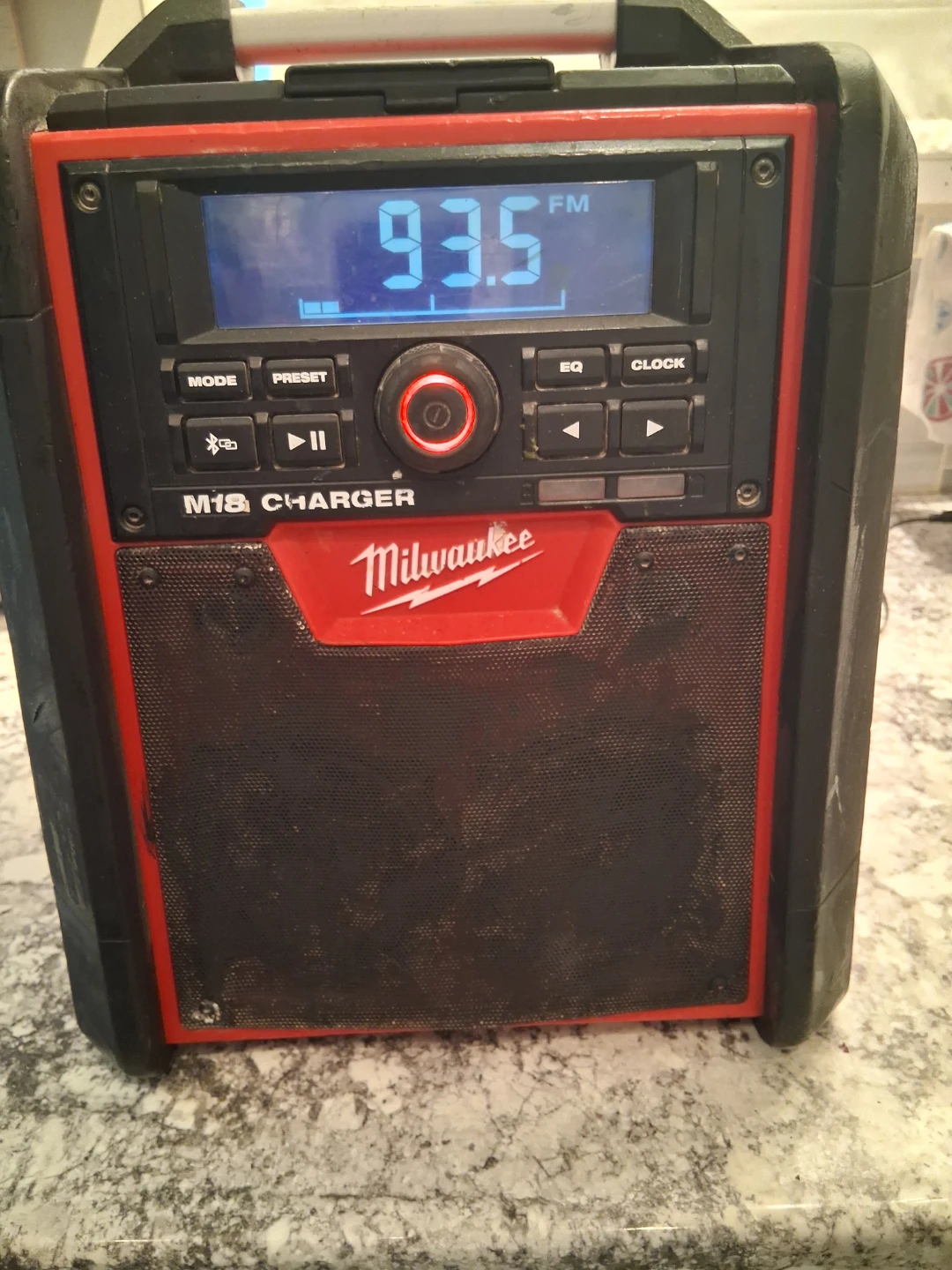 Milwaukee M18 Bluetooth radio/charger and an impact driver