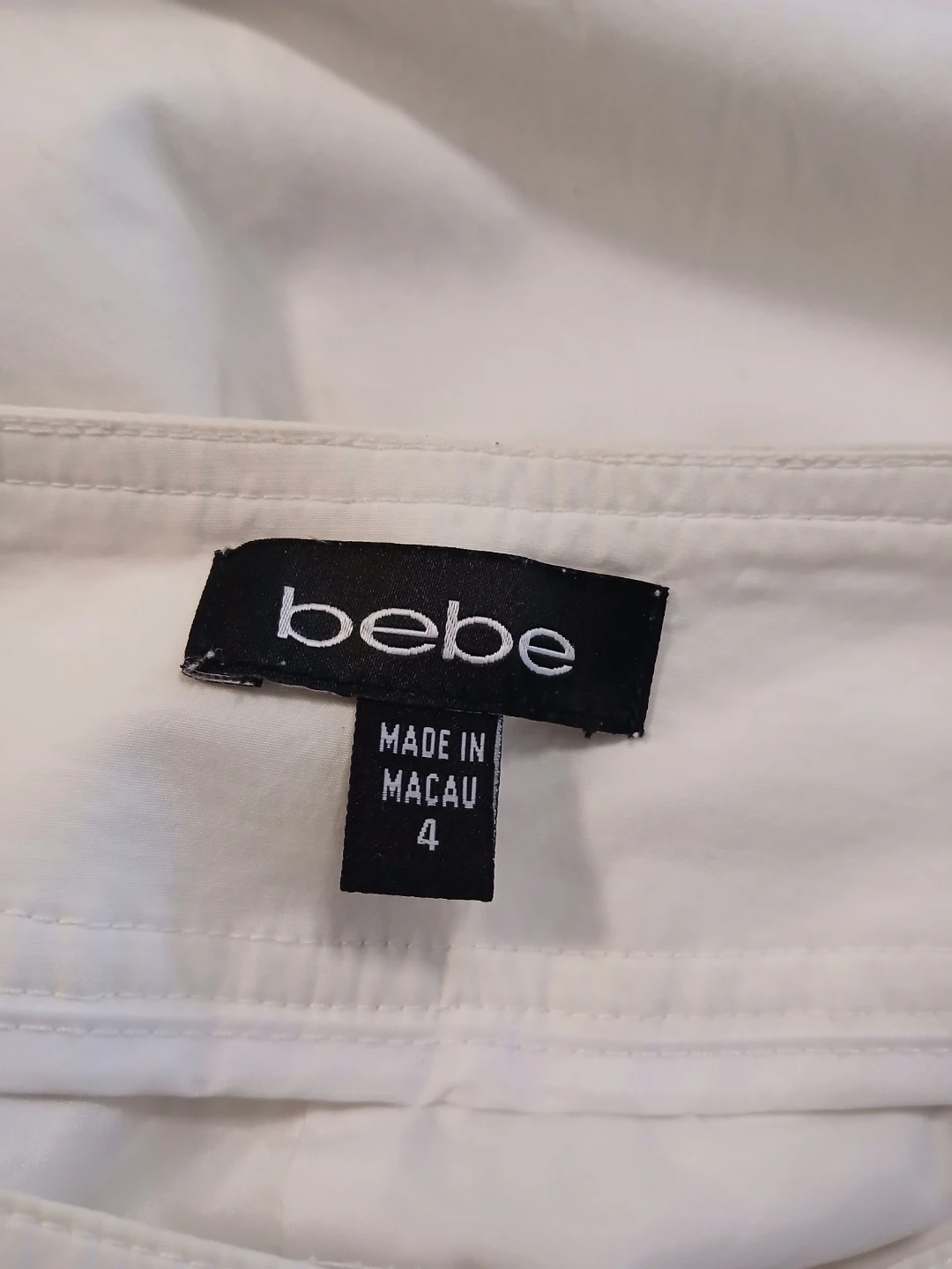 Bebe White Capri Size 4 and White Denim Skort Size 10. $6 EACH. - photo 2